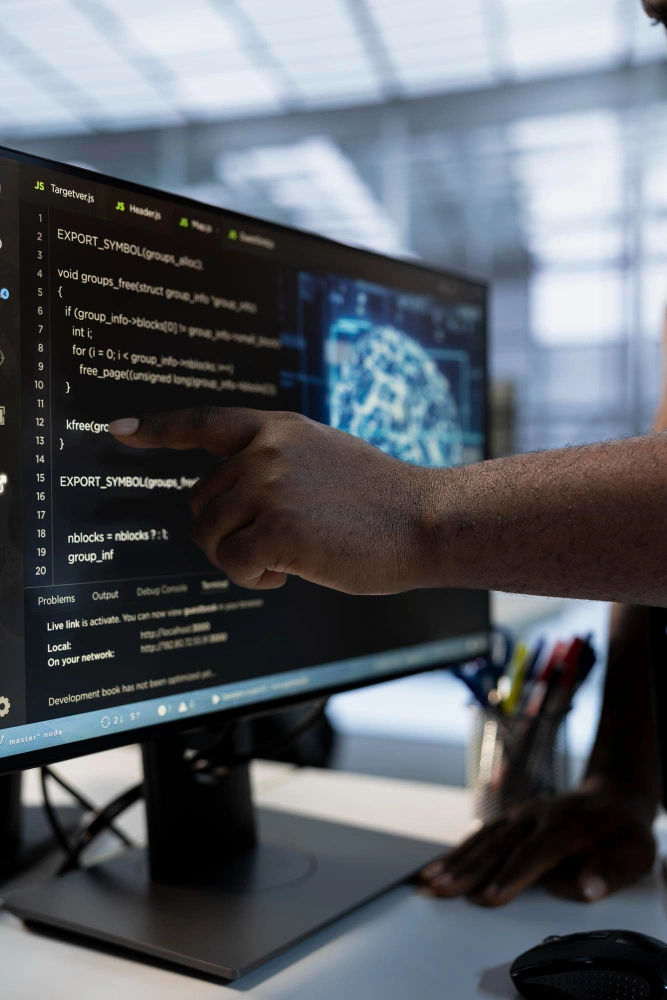 Developers collaborating on nearshore software project using AI tools to streamline code creation
