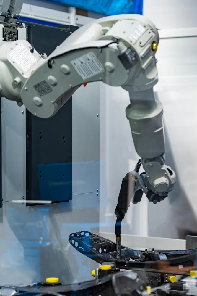 Physical AI robot operating in a modern manufacturing facility